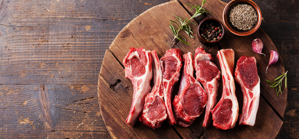 Image is of cooked lamb cutlets on a plate